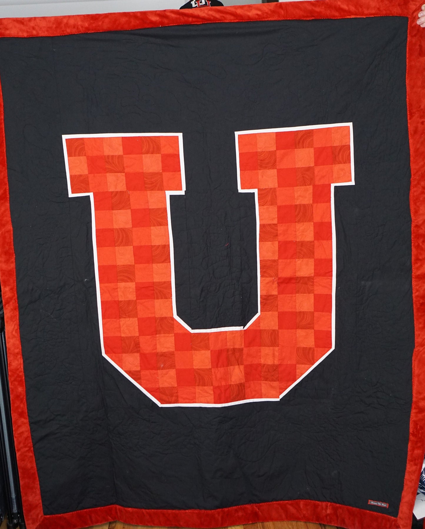 Licensed University of Utah Block U with white edging quilt.