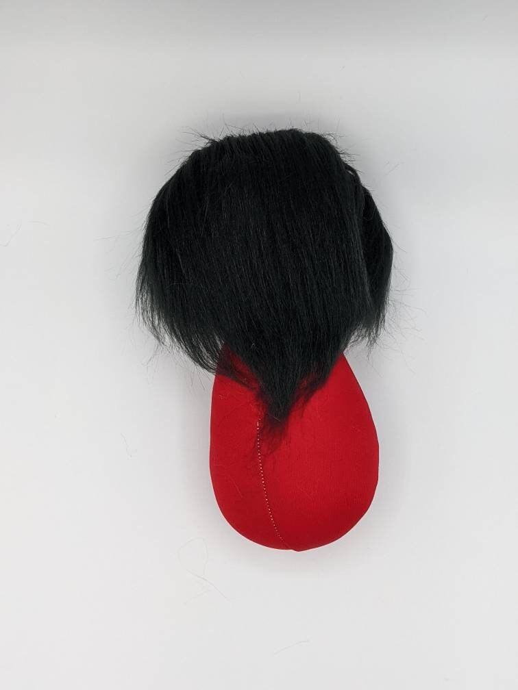 Officially licensed University of Utah 10" doll. Drum and feather.